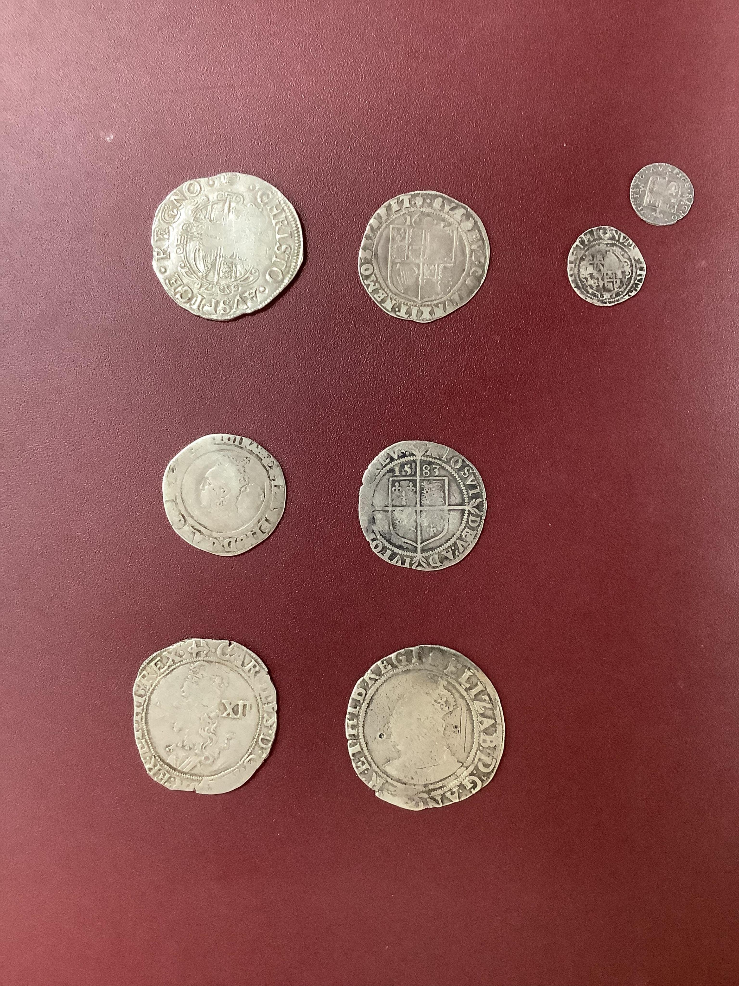 British Tudor and Stuart hammered silver coins, an Elizabeth I shilling and two sixpences, a James I sixpence, two Charles I shillings, a Charles II penny, first issue, 1660-62, (S3311) VF, twopence (S3310) (8)